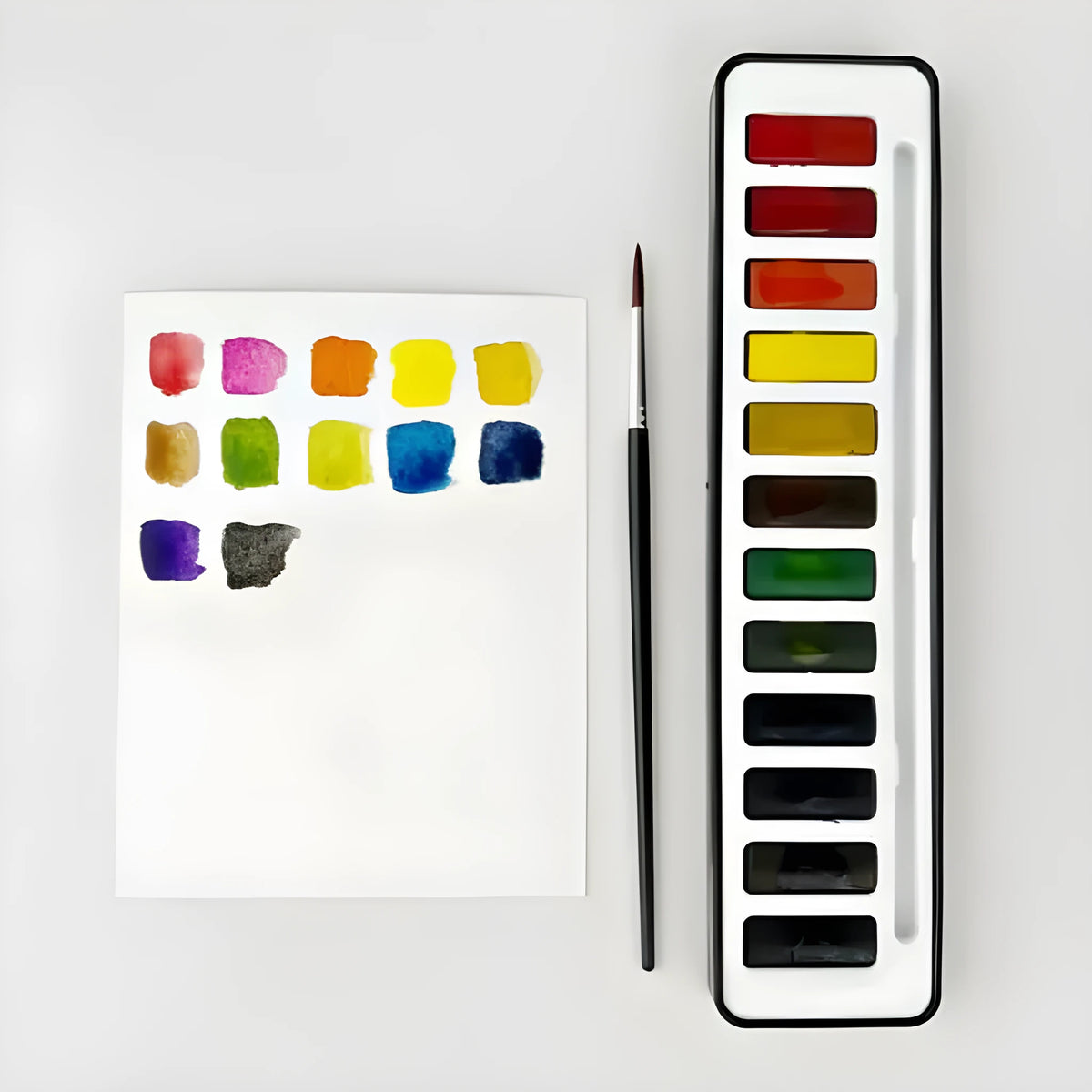 Portable household paint box with twelve natural pigment colours in a fashionable compact palette set for artists and students