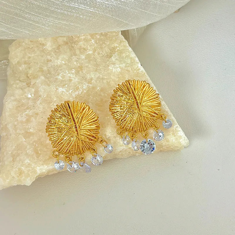 Gold geometric round earrings with electroplated metal construction for women