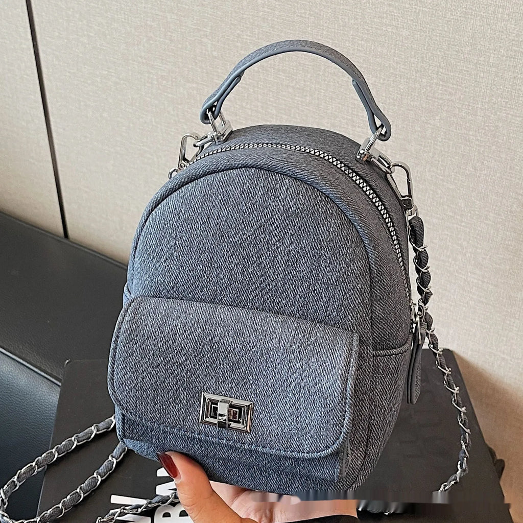 Korean style solid colour PU casual backpack with three-dimensional pocket, shown in black, beige, blue, dark blue or khaki.