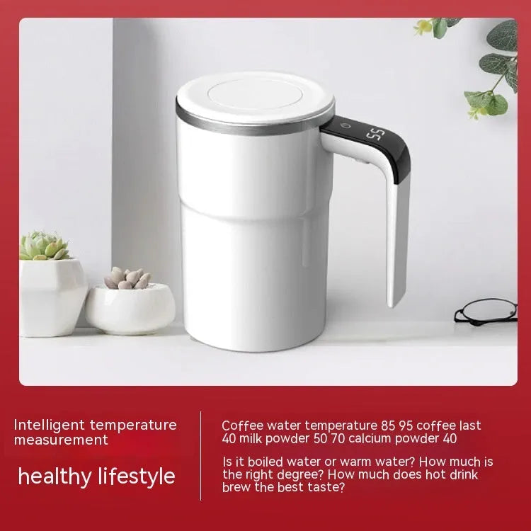 White electric stirring mug with LCD temperature display and magnetic stirrer base