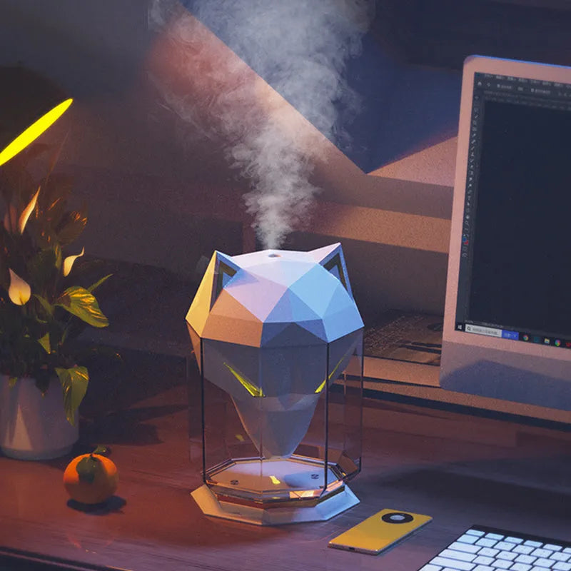 War Wolf ultrasonic air humidifier with colourful LED lights on desktop with USB cable