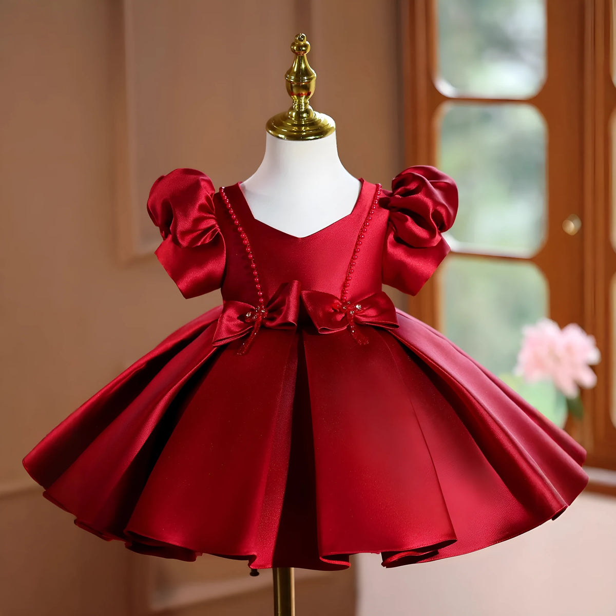 Girls wine red polyester princess party dress for birthdays and evening events, available in 80cm to 150cm height sizes.