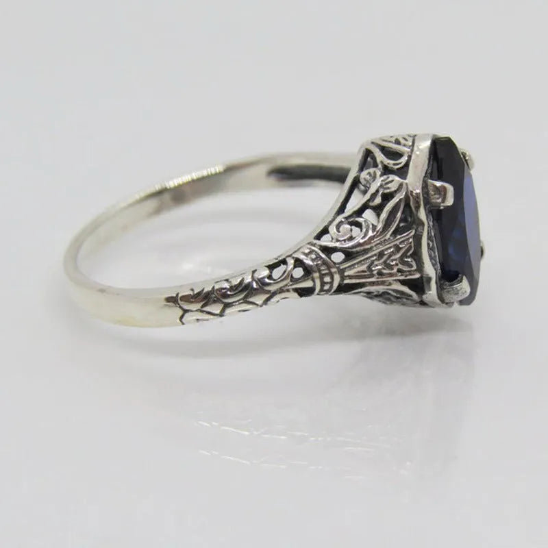 Women's silver geometric hollow ring with zircon stones on alloy base