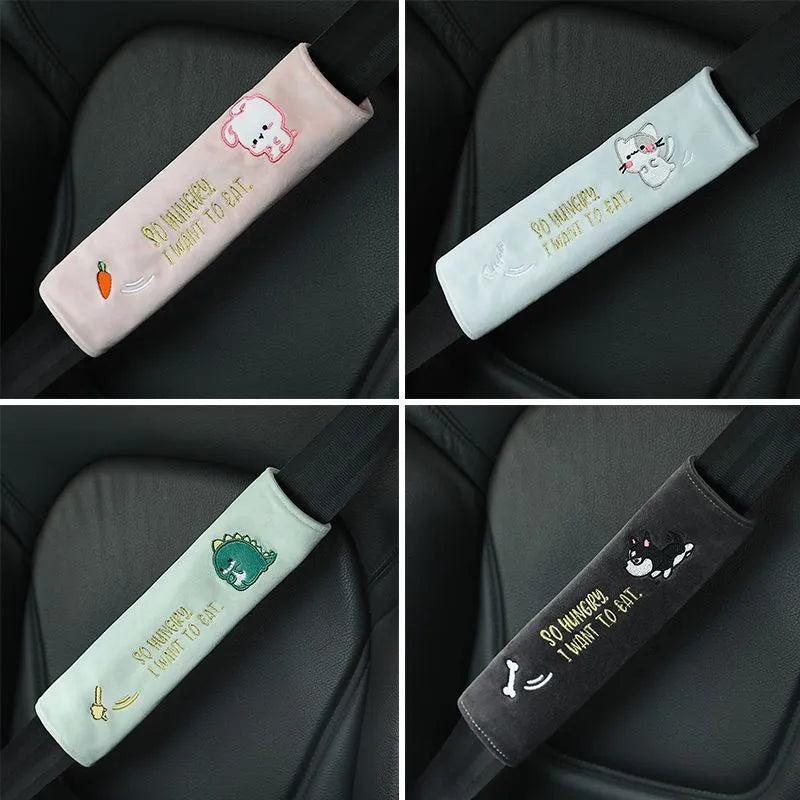 Plush embroidered car headrest shoulder pad in blue, green, black or pink with cartoon lion, dinosaur, kitten, puppy or rabbit motif