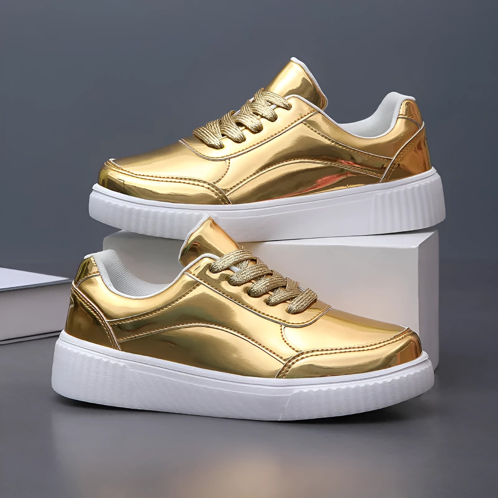 Rose gold and gold sequin platform sneakers with thick MD sole and stitching detail.