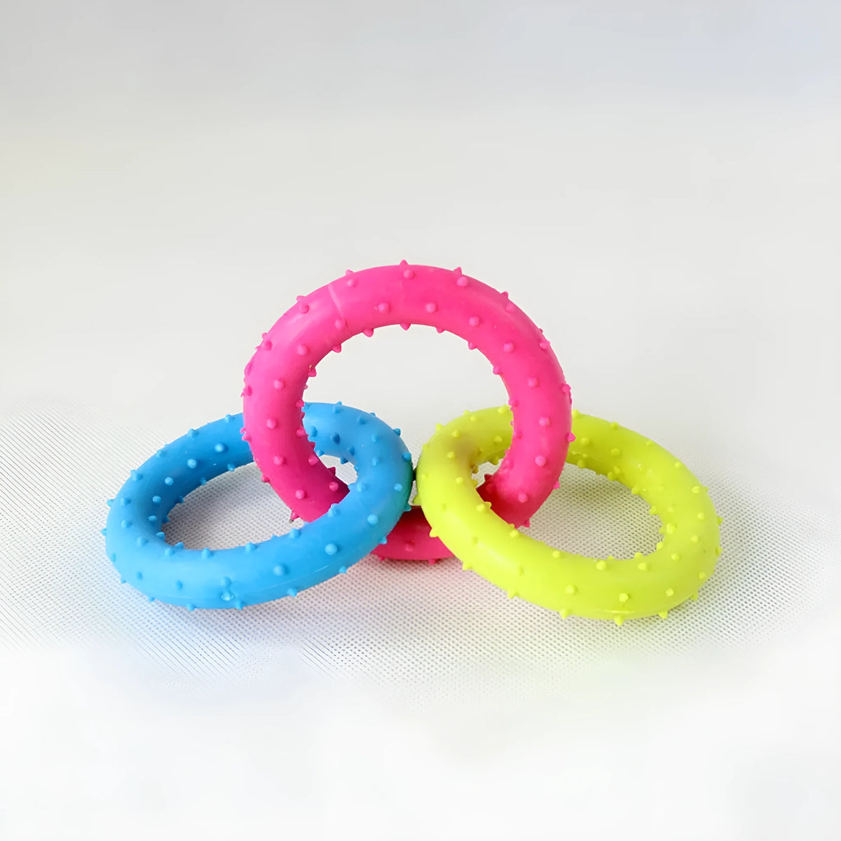 TPR rubber dog chew toy with three-chain design and molar shape for aggressive chewers