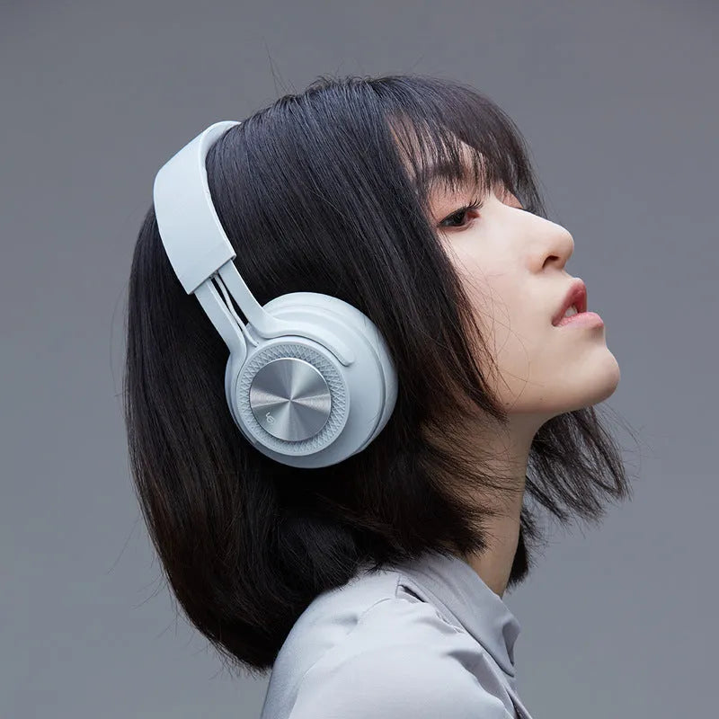 Sports wireless Bluetooth headset in black colour showing compact design with ear hooks