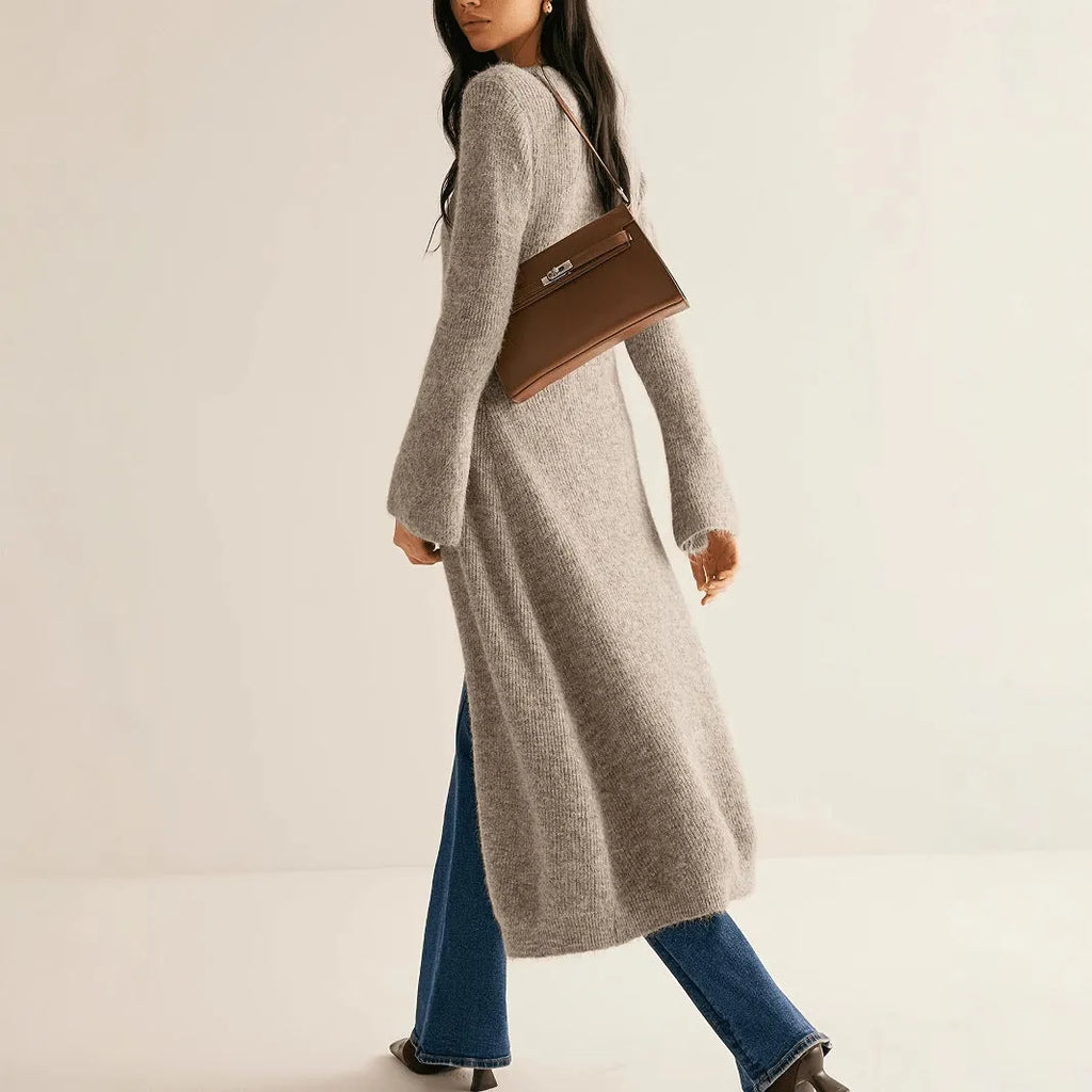 Khaki coloured women's long sleeve button-front cardigan coat on a hanger.