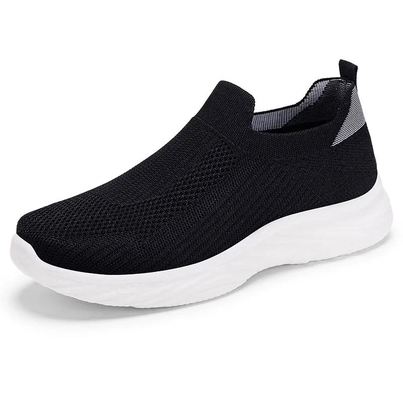 Women's solid colour Flyknit casual running shoes with a round toe and soft PVC sole.