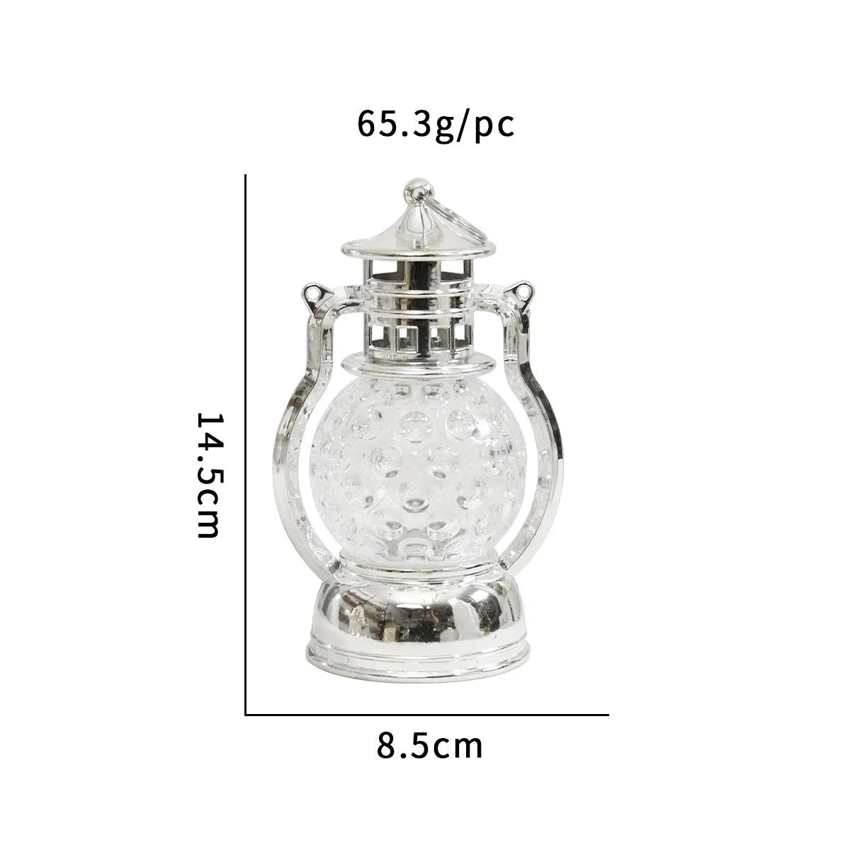Creative retro-style small oil lamp LED night light in gold or silver finish on a table.