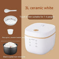 White and beige plastic multi-function 3-litre rice cooker with black inner pot and accessories.