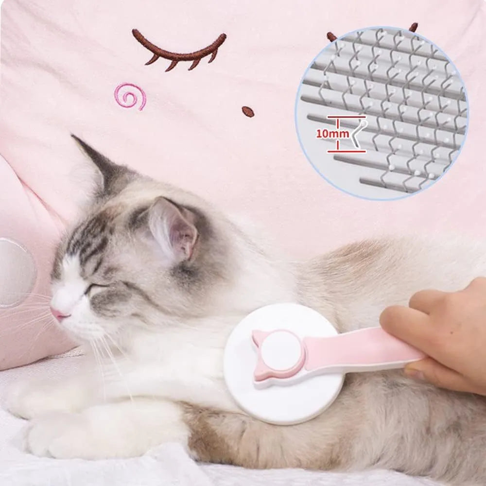 Self-cleaning cat brush with blue handle and metal pins for grooming pets