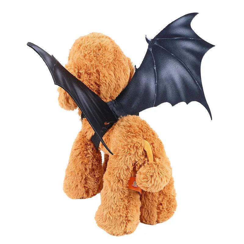 Black cloth bat wings for pets in three sizes: 64cm large, 55cm medium, 40cm small, attached to a dog’s harness
