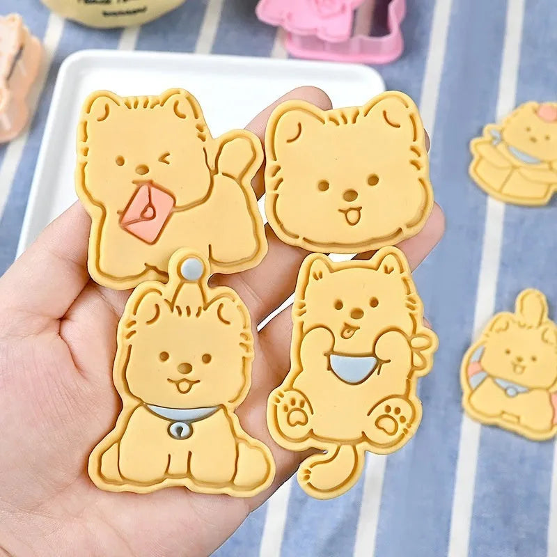 Three-dimensional press mould for creating puppy-shaped biscuits with seven design options including birthday hats