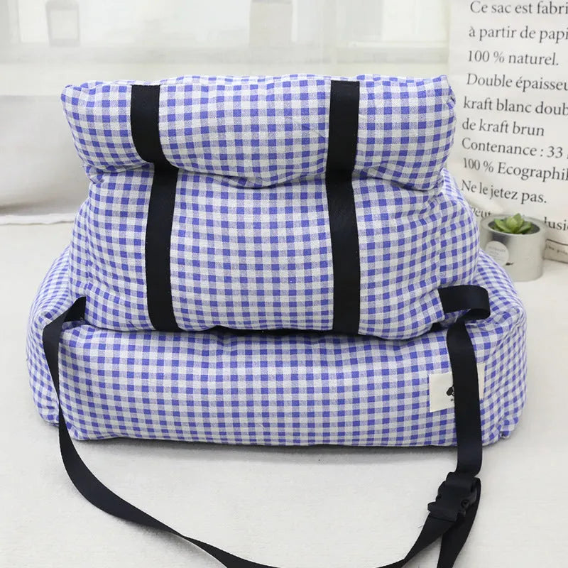 Car-mounted pet outing nest in blue plaid cloth for dog transport during vehicle journeys