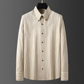 Coffee coloured striped men's long-sleeved shirt with a slim fit and wool lining on a hanger.