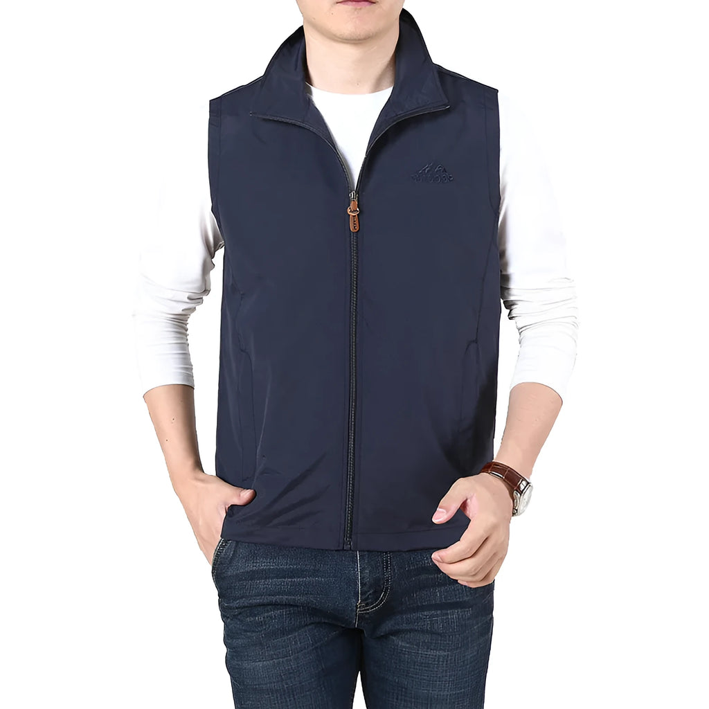 Men's solid colour thin waistcoat vest with side pockets shown in khaki colour, laid flat.