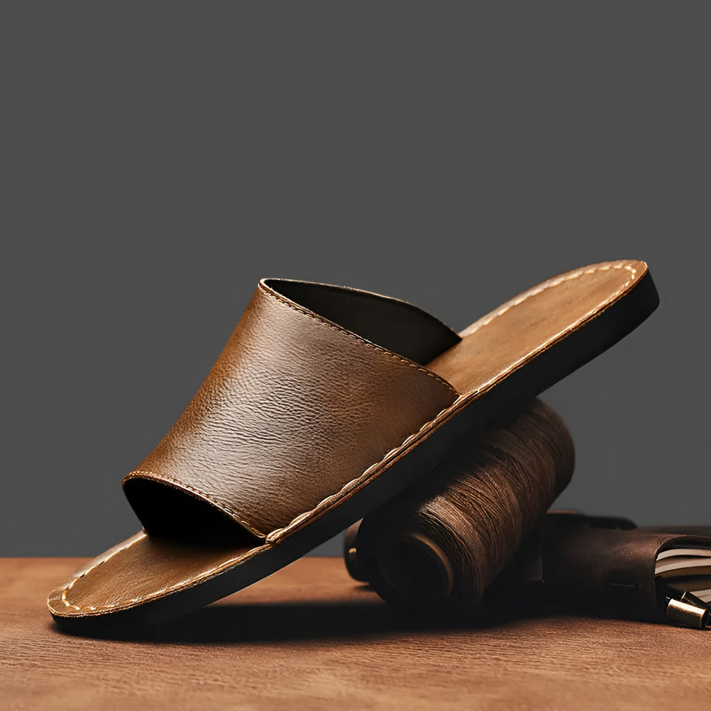 Men's brown leather sandals with rubber soles showing casual outdoor design