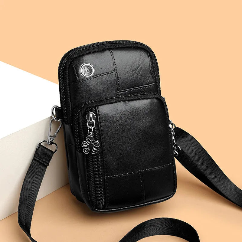 Mini vertical phone crossbody bag in PU leather with sandwich pockets, shown in available colours
