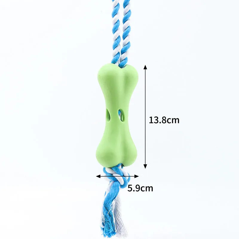 Green porous bone-shaped dog toy with rope knot texture for treat stuffing and teeth cleaning