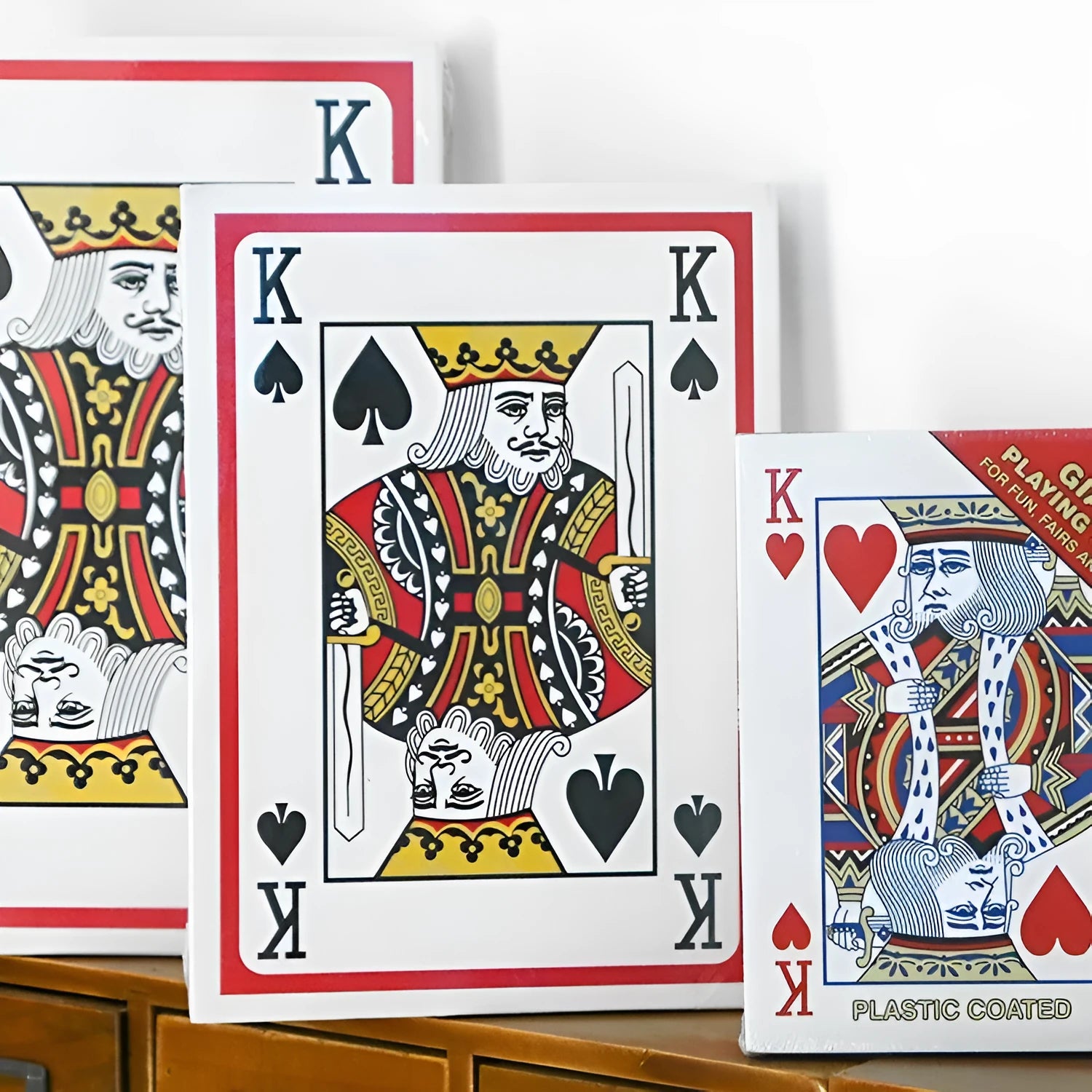 Oversized playing cards showing four, six, and nine times size options compared to standard cards