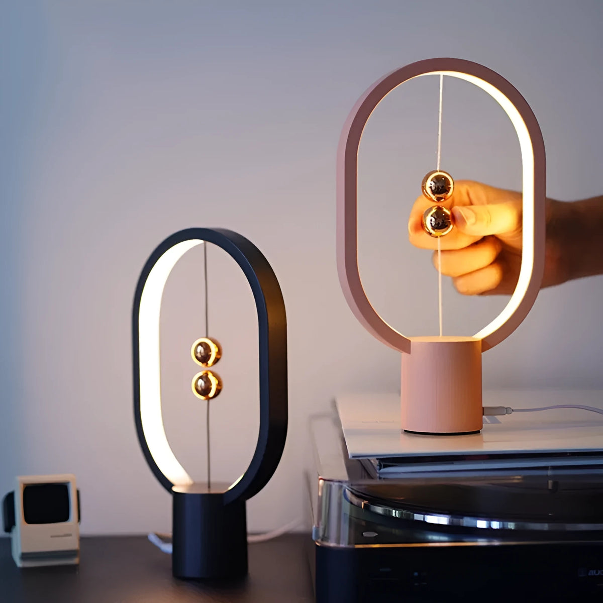Mini magnetic switch USB LED table lamp with floating switch, plastic shade, available in black, green, pink, red, white, and wooden colour.