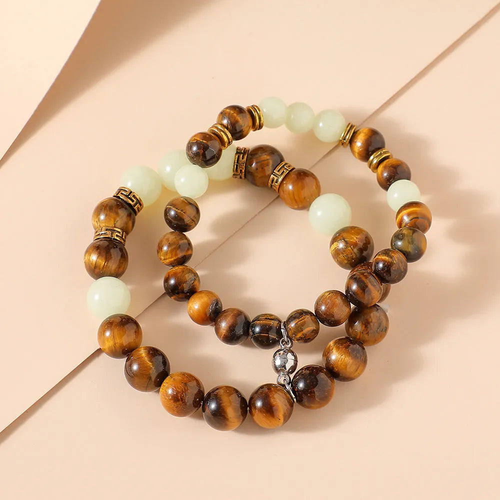 Amber geometric couple bracelets with luminous patterns and retro fashion styling