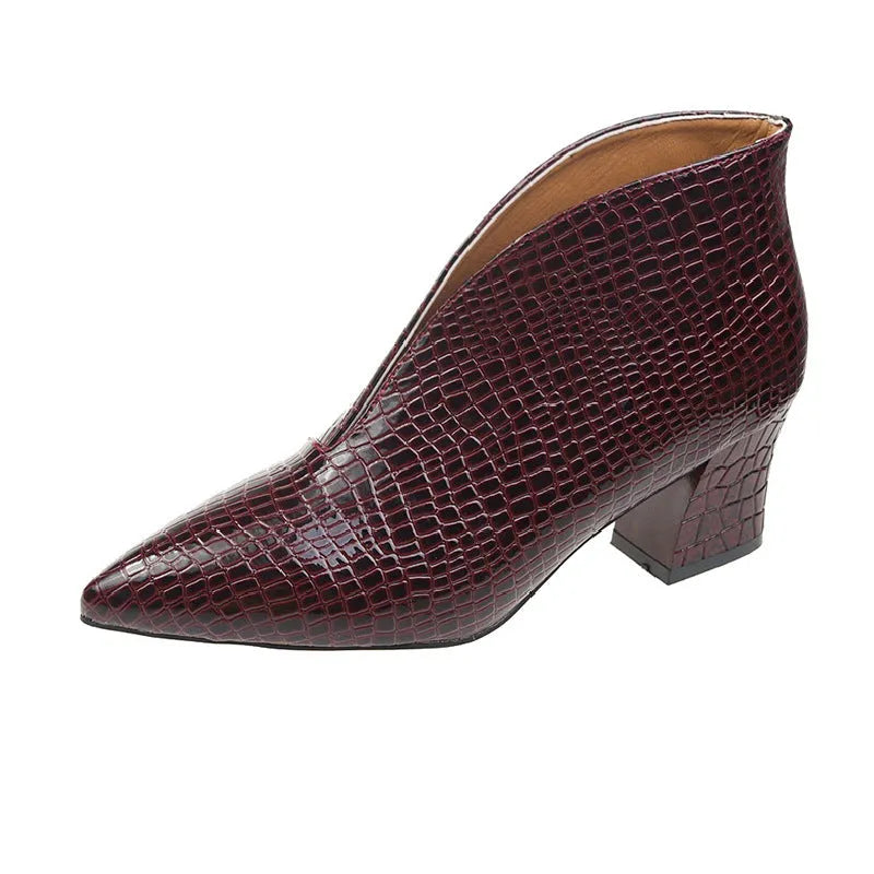 Women's V-cut ankle boots with pointed toe and embossed PU upper in black colour with chunky heel