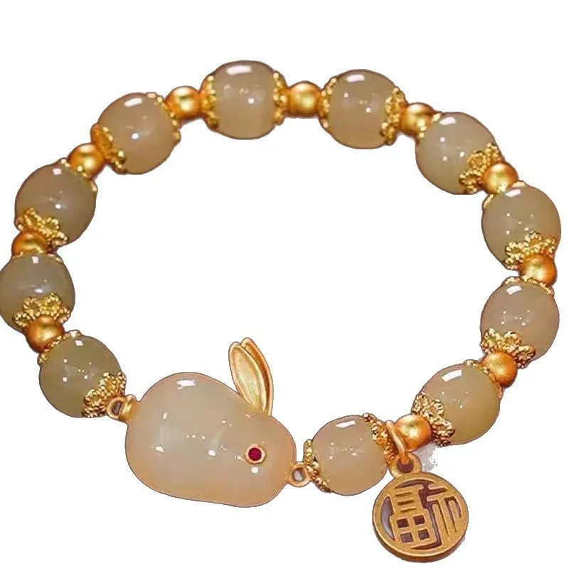 Rabbit motif bracelet with peace buckle clasp made from glass and coloured glaze