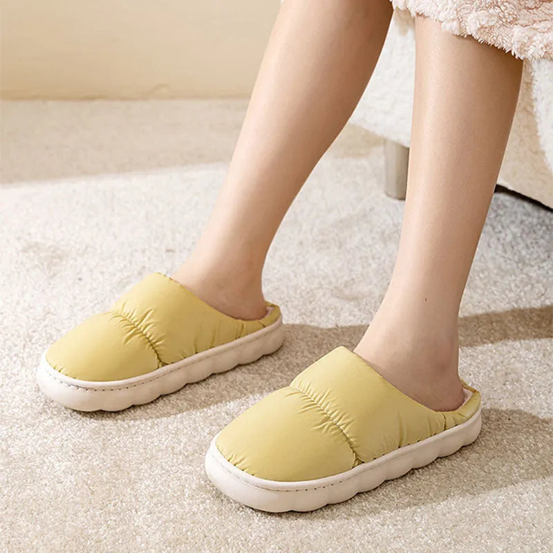 Down cotton slippers with artificial leather upper, rubber anti-slip soles, and plush lining in blue, green, grey, pink, or yellow