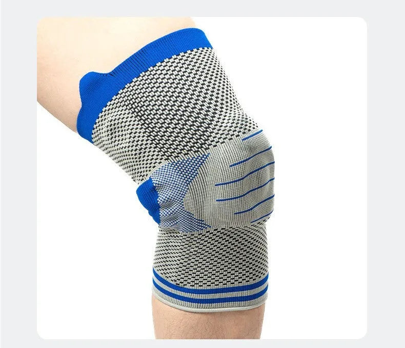 Cotton knee pad with silicone massage spring bar shock absorber in black and blue colour.