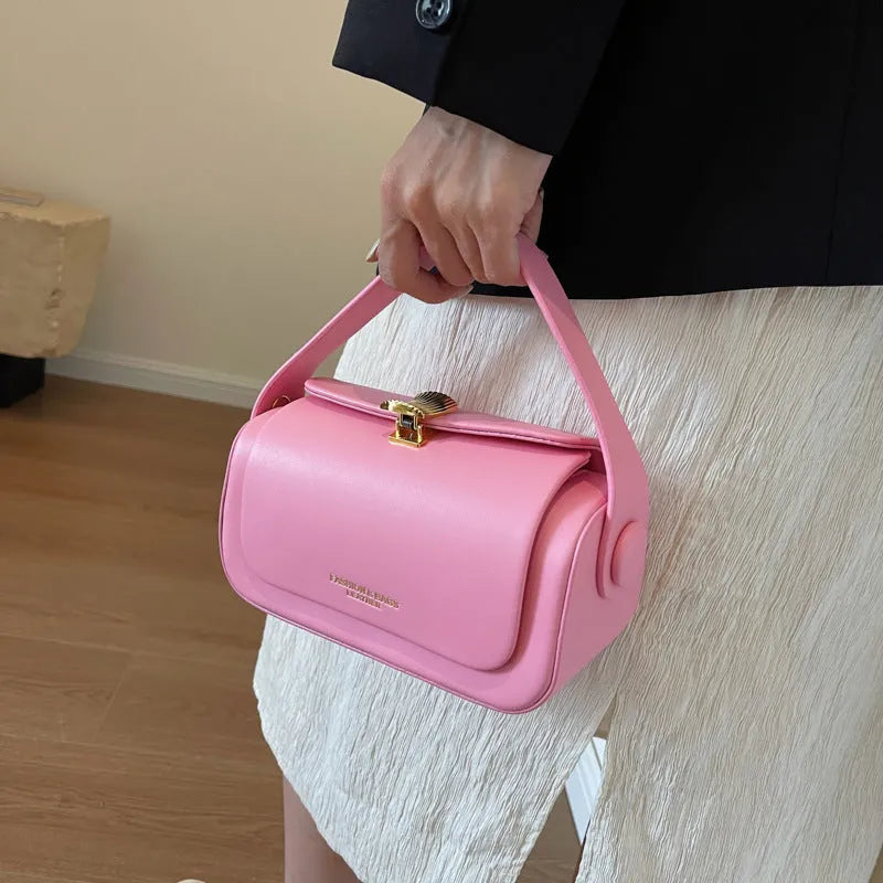 Women's shoulder messenger bag in PU leather with letter personalisation, shown in beige colour with stitching details