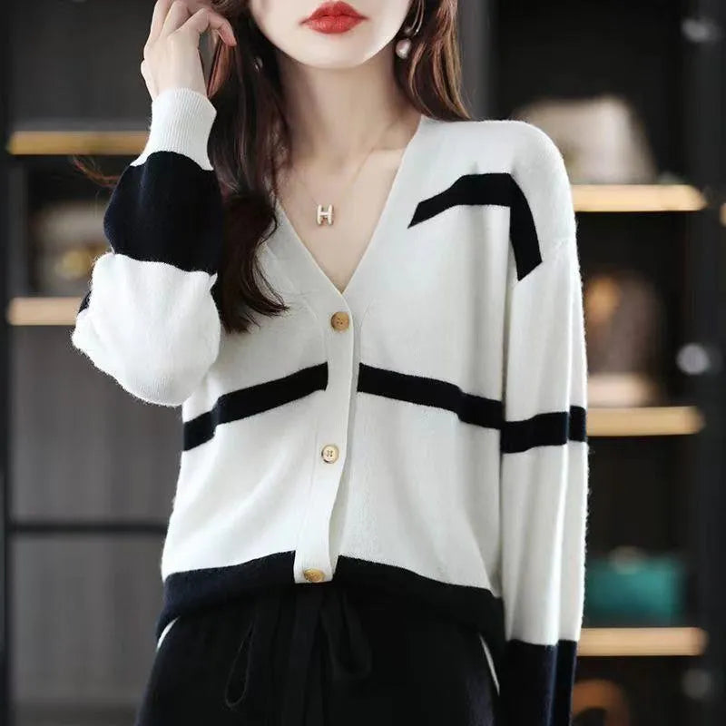 Women's V-neck cardigan with 3D striped pattern in slim fit, available in black/white, green, camel, and black apricot colours