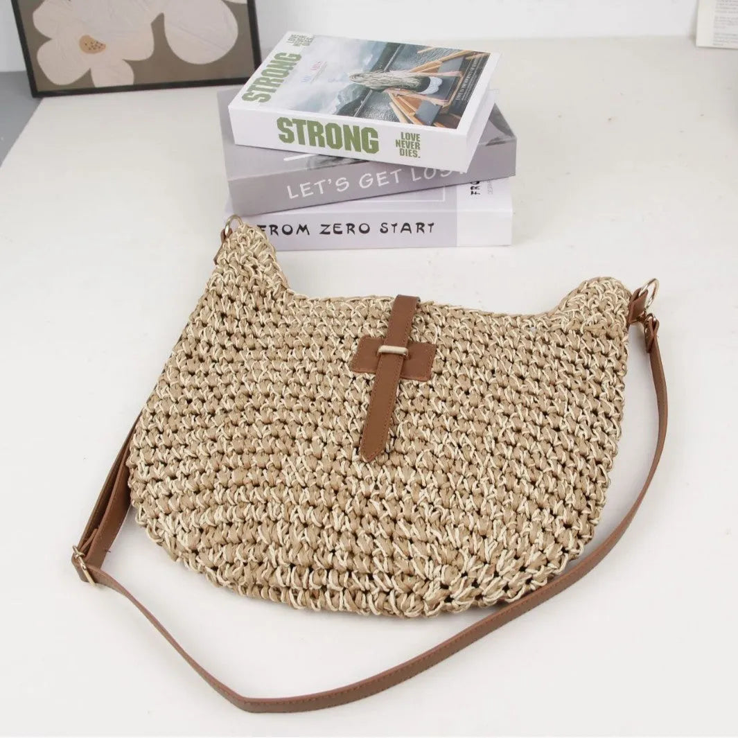 Handmade beige woven shoulder bag with decorative sewing thread details and sandwich pocket