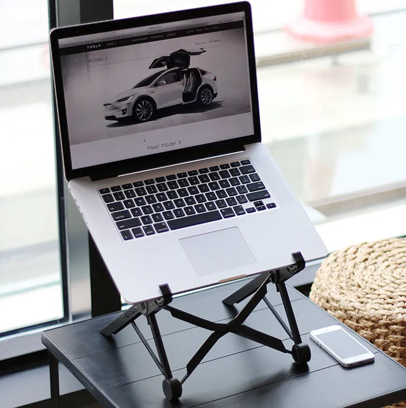 Black foldable portable laptop stand with enhanced nylon construction shown folded to 35.4cm with carrying case