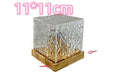 USB rechargeable LED water ripple night light with remote control on a table.
