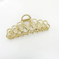 Minimalist large alloy hair clip with tassel in gold or silver for updo hairstyles.
