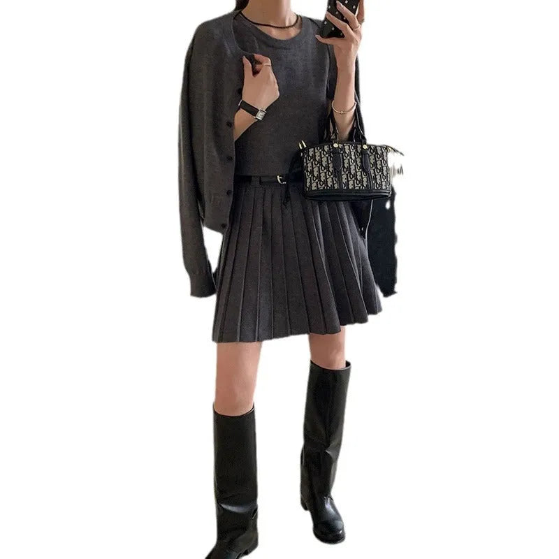 Women's national style knitted two-piece with vest skirt and cardigan featuring 3D pattern texture and adjustable belt