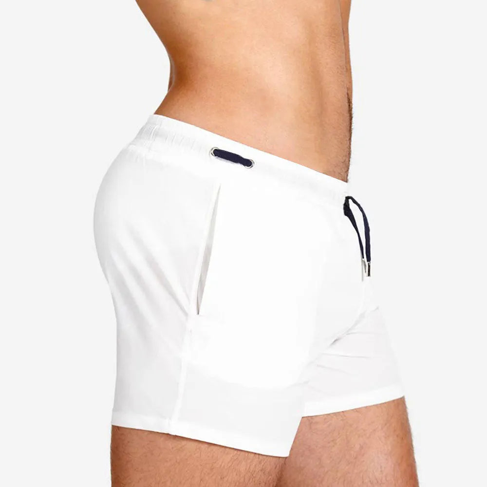 Mesh-lined quick-dry sports shorts in multiple colours on a white background