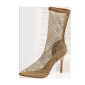 Gold mesh high heel sandals with pointed toe and stiletto heel on rubber sole