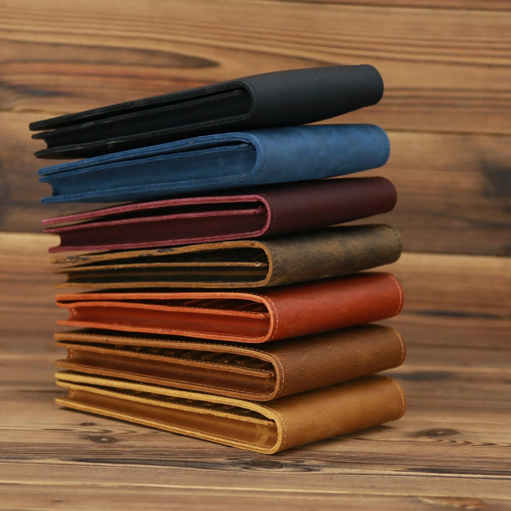 Men's long cowhide leather wallet showing card slots, money pocket, and mobile phone compartment.