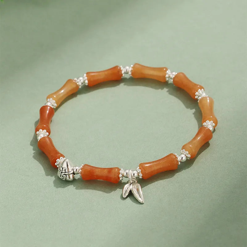 Green Aventurine bamboo crystal bracelet with multiple gemstones including strawberry quartz and olive jade