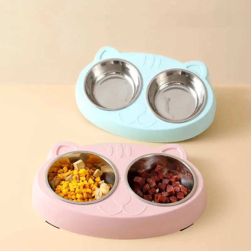 Blue plastic pet feeder with two bowls measuring 26.5cm by 17cm for food and water