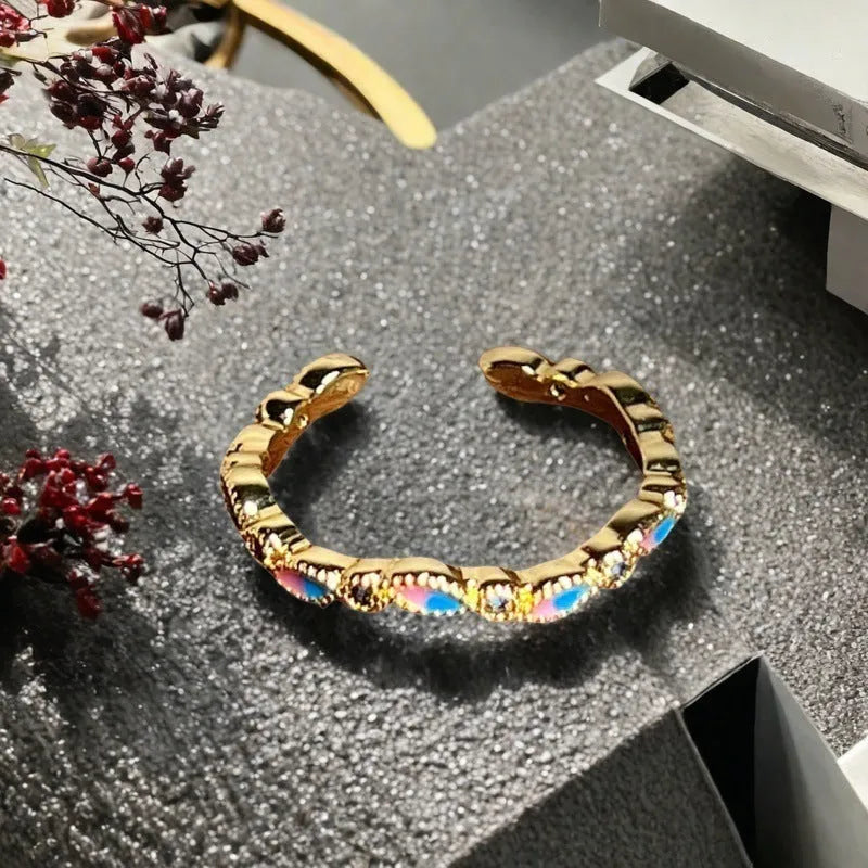 Adjustable copper ring with vintage oil-dripping gourd design, inlaid zircon stones, and flower and bow shapes in New Chinese style
