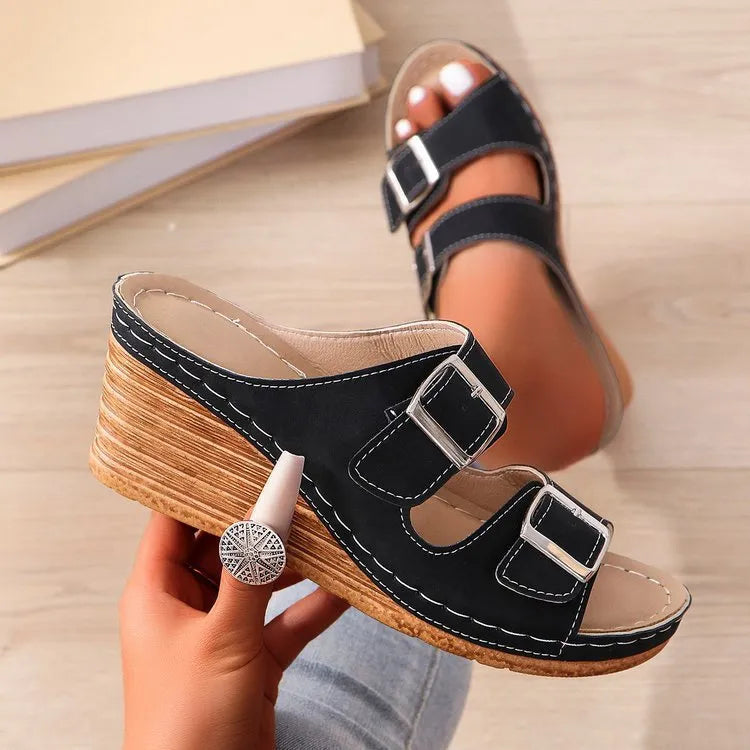 Women's wedge sole beach slippers with decorative outer buckle in creamy-white colour