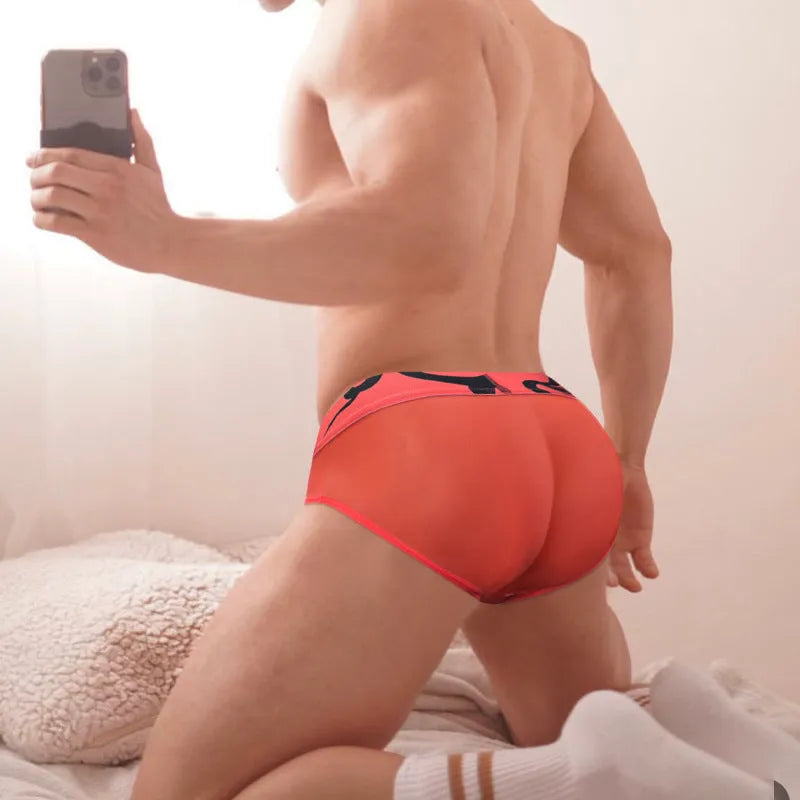 Men's black cotton modal sports boxer shorts with low-waist design and solid colour pattern