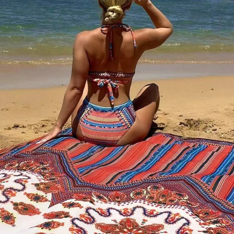 Women's three-piece swimsuit set with cutout blouse, high-waist pants, and coordinating coat in polyester fabric