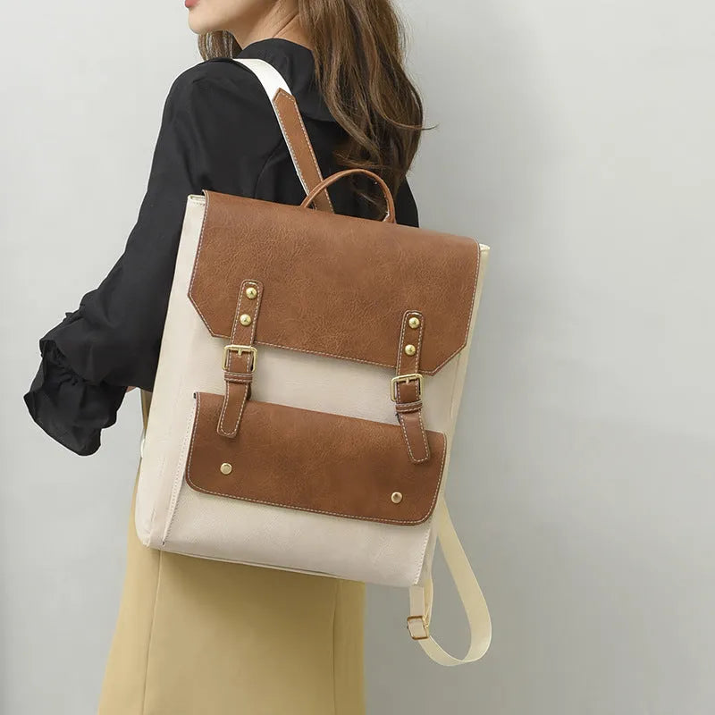 Korean style retro backpack in soft PU material with ventilation features and burden reduction design