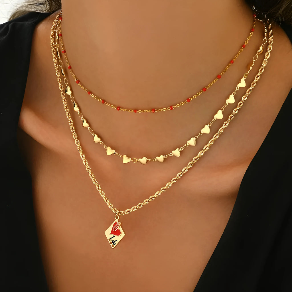 Geometric three-layer heart pendant on an adjustable zinc alloy clavicle chain necklace.
