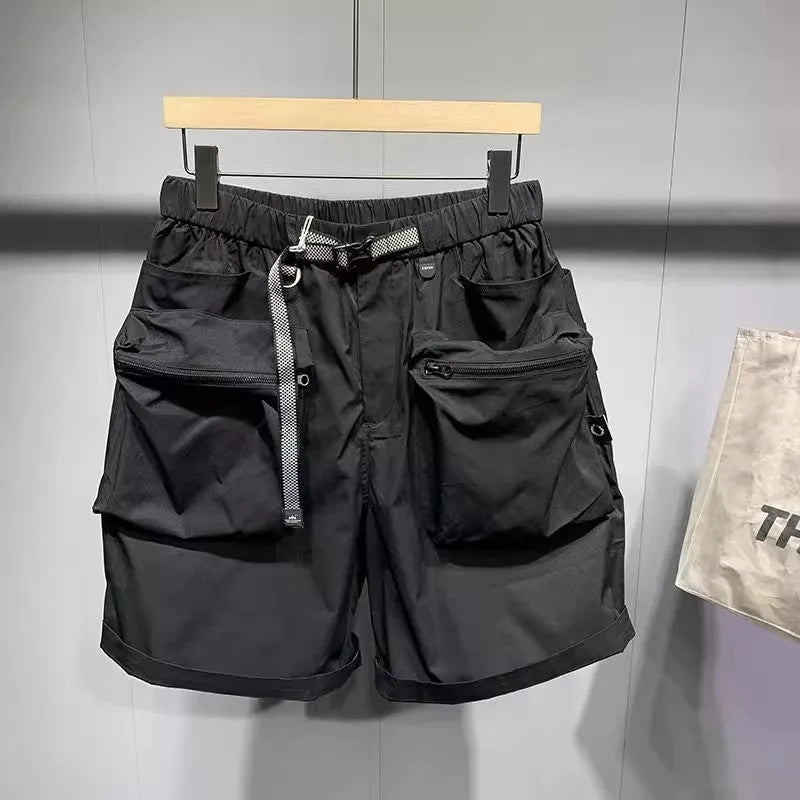 Men's black workwear shorts with loose fit, pockets, and non-ironing fabric, sized for waists up to 115kg